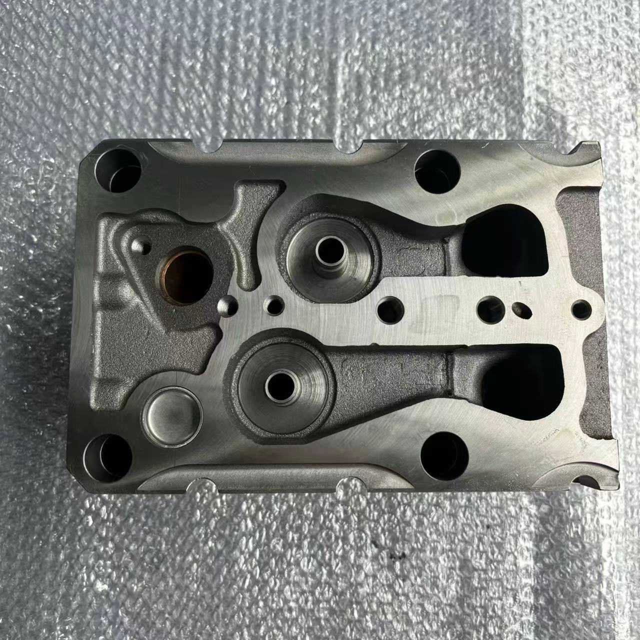 Culata de cilindro VG1540040068 Euro II de dos válvulas para piezas de motor diésel HOWO STR