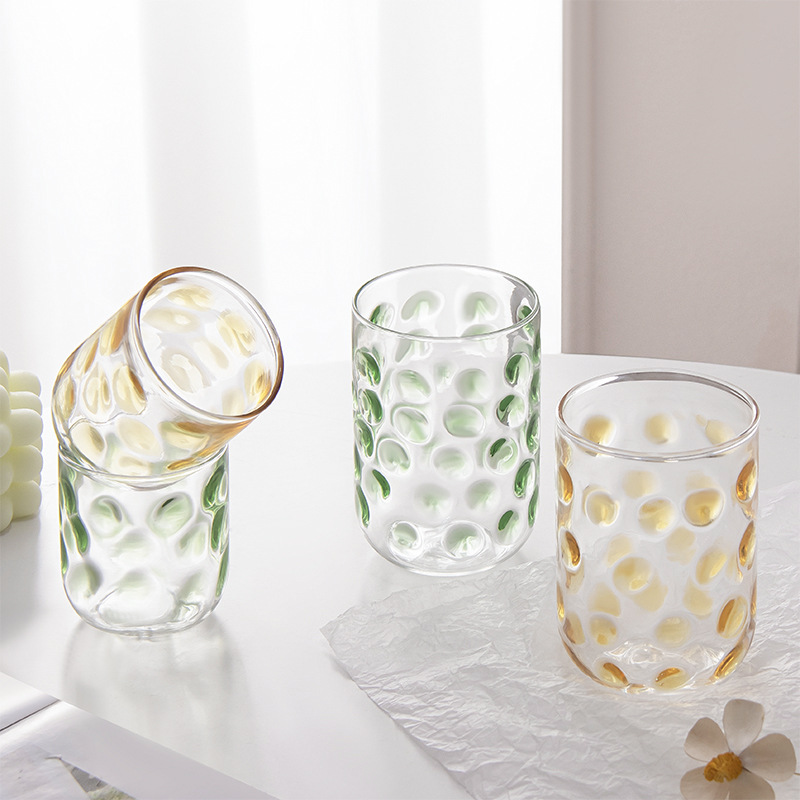 Polka dot painted glass cup