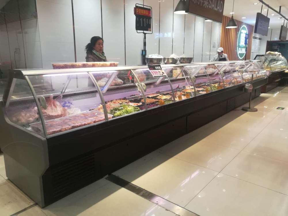 Vitrina refrigerada para carne con cristal curvo