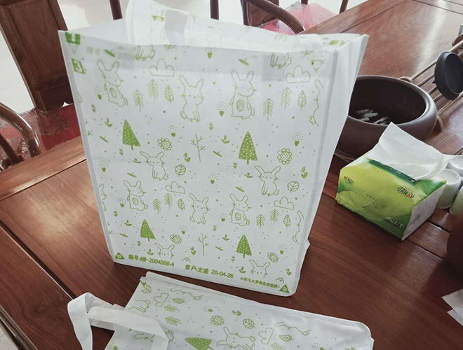 Water soluble nonwoven bag