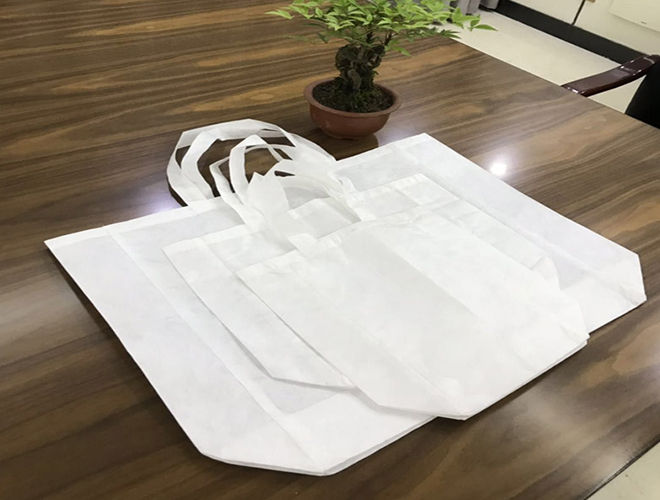 Water soluble nonwoven bag