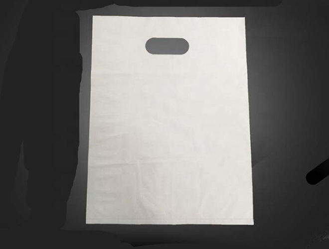 Water soluble non woven handel bag