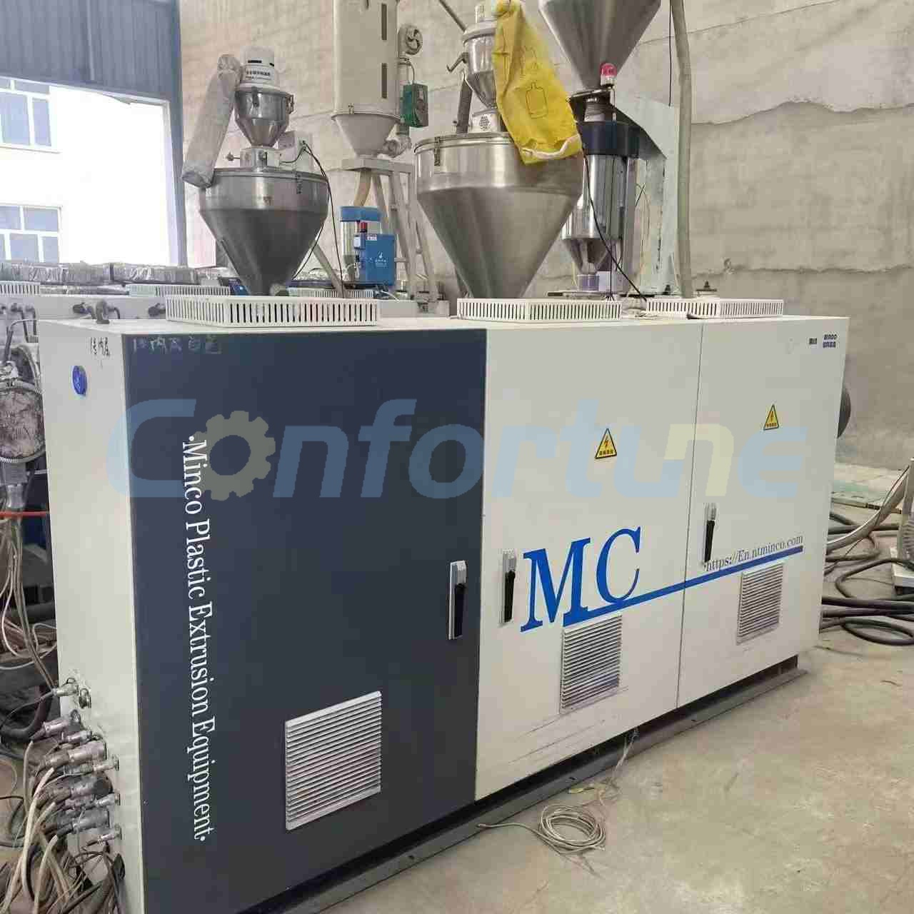 Высокоскоростная линия для производства труб из HDPE методом трехслойной соэкструзии ABC, 110–315 мм, Minco Высокоскоростная линия для производства труб из HDPE методом трехслойной соэкструзии ABC, 110–315 мм, Minco