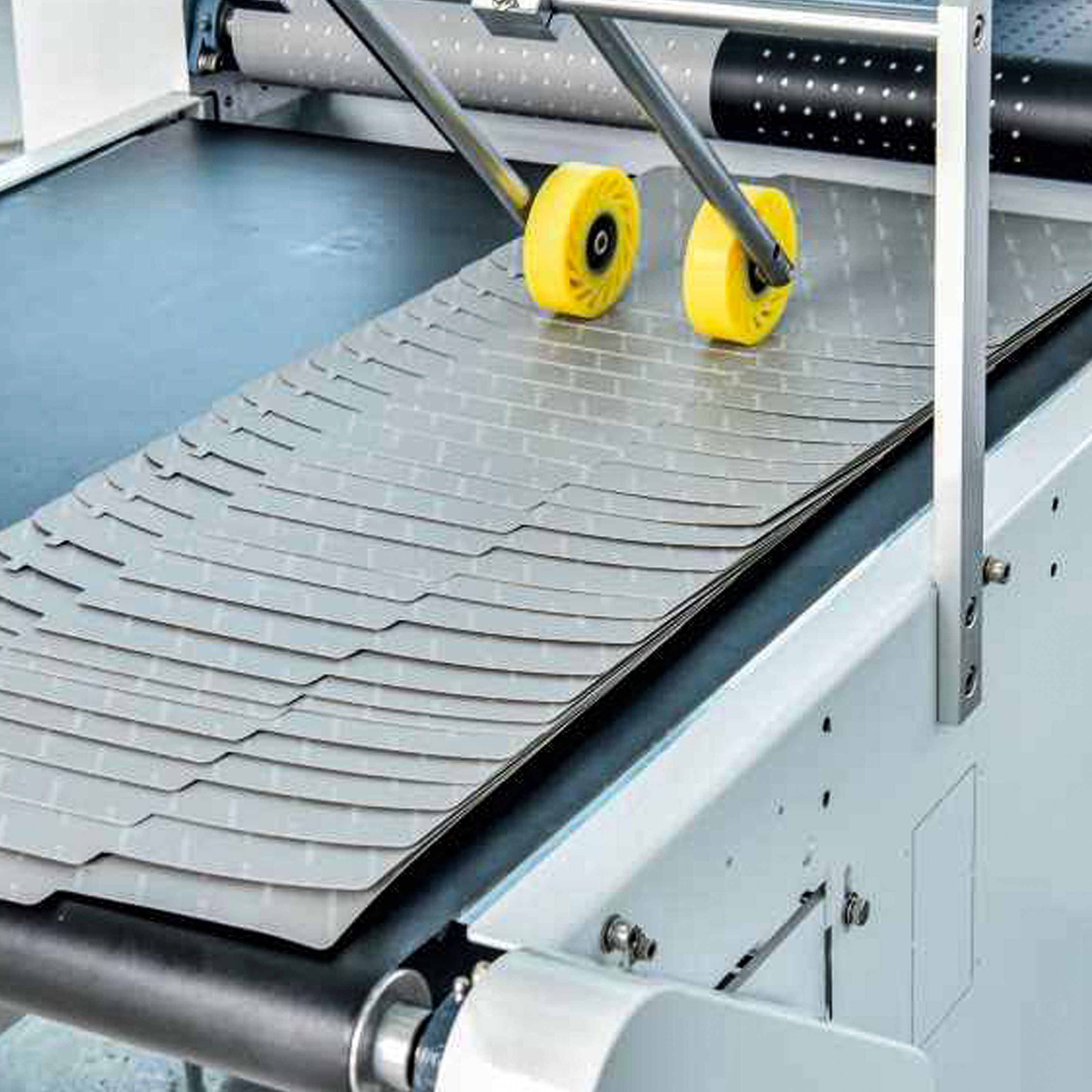 Máquina semiautomática para el pegado de cinta adhesiva de doble cara
