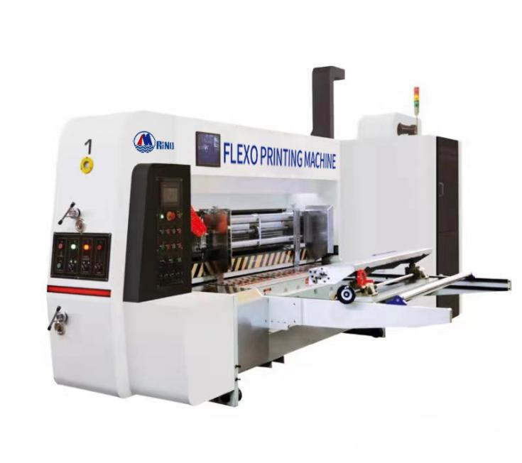 Máquina de impresión flexográfica en tres colores con ranurador y apilador Máquina de impresión flexográfica en tres colores con ranurador y apilador