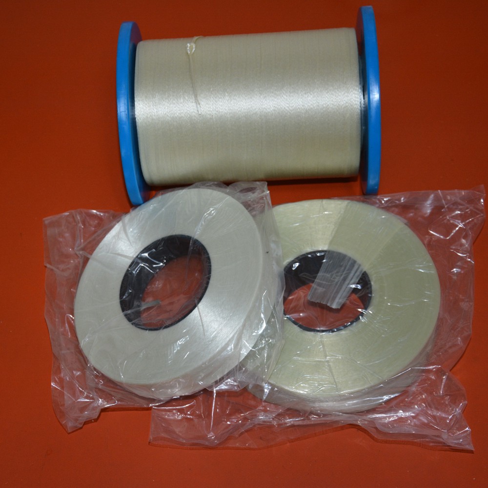 Weft free tape with mesh