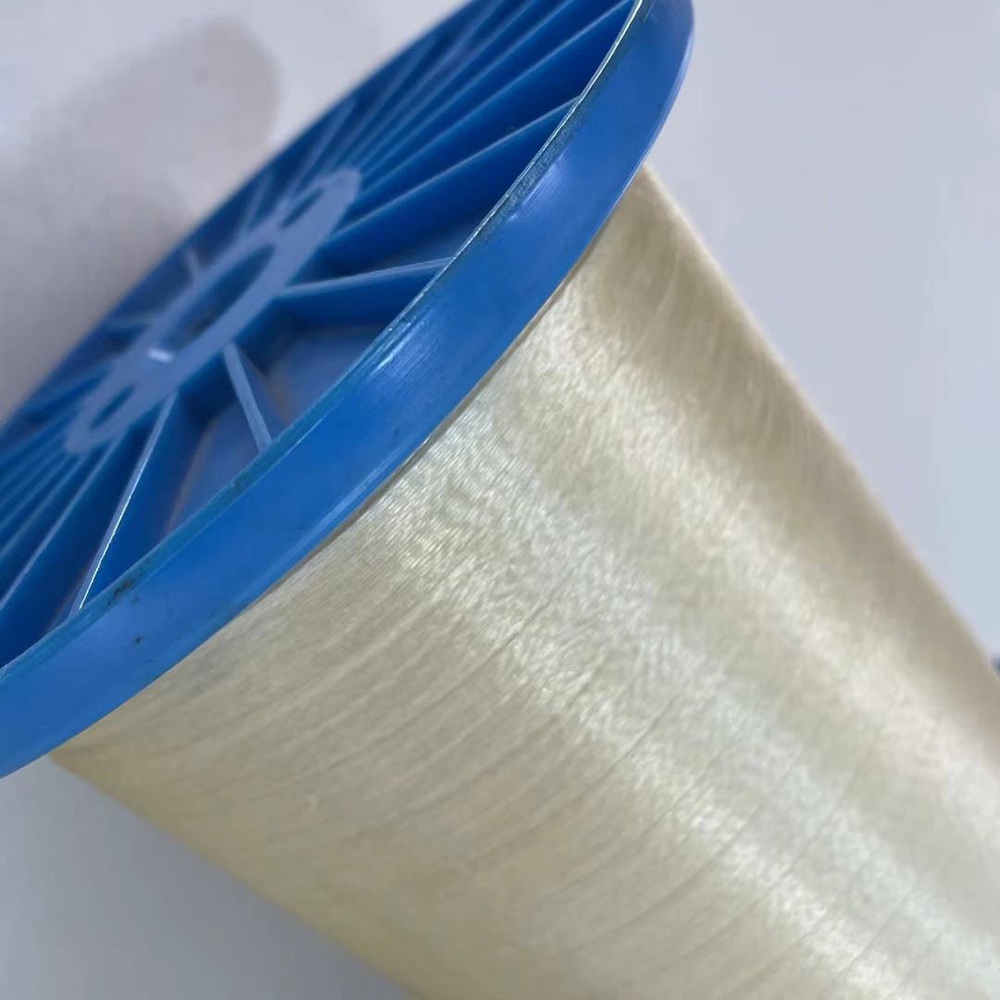 Weft free tape with mesh