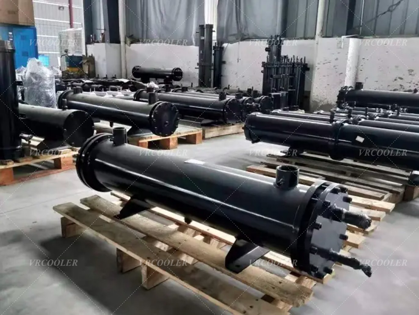 Where is a shell and tube evaporator commonly used for liquid cooling?