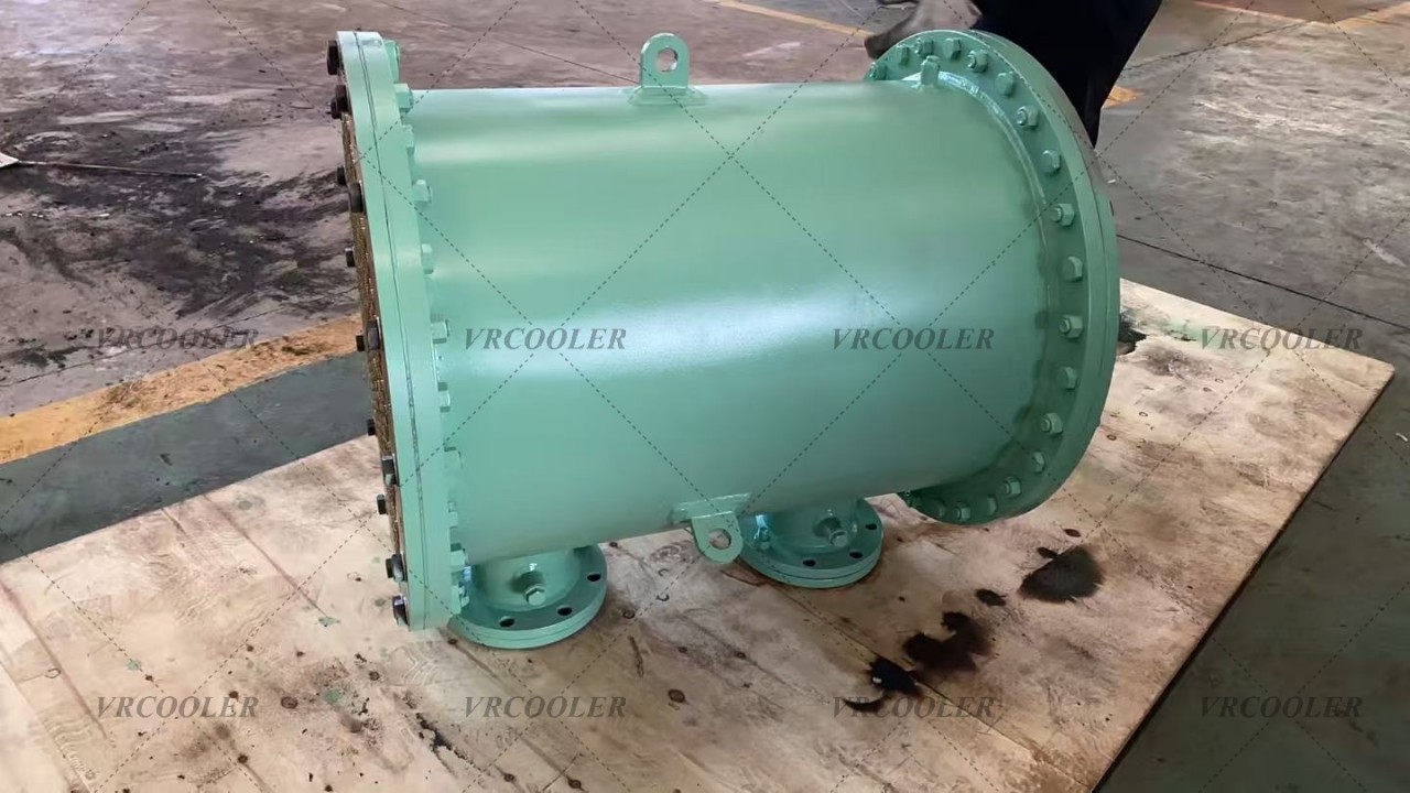 How is a freshwater generator evaporator tube bundle cleaned?