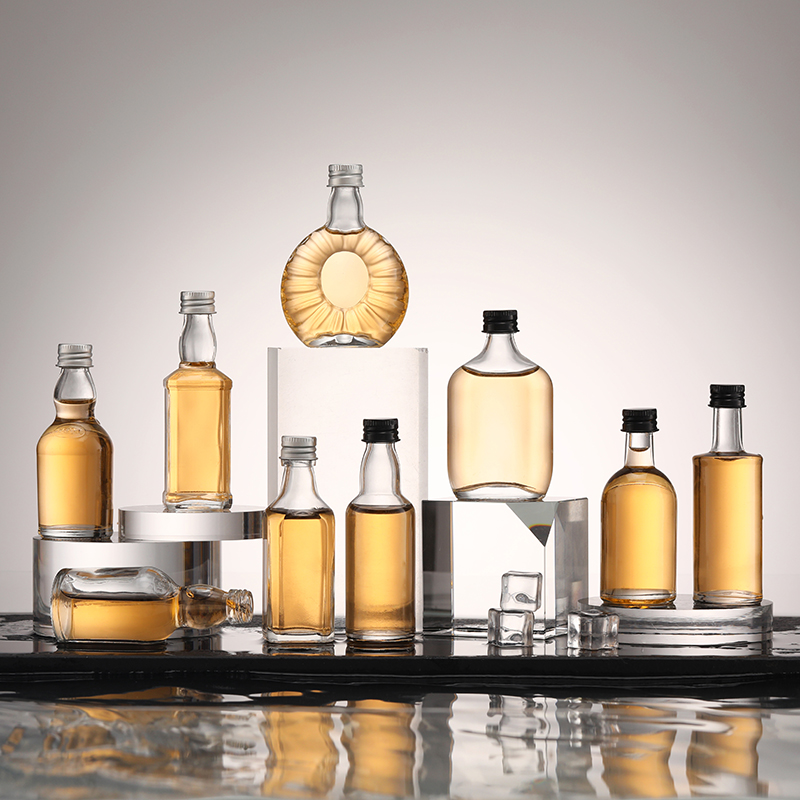 Mini botellas de licor de vidrio personalizadas transparentes