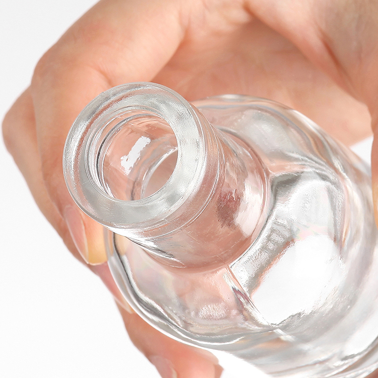 Mini botella de licor vacía de vino de vidrio