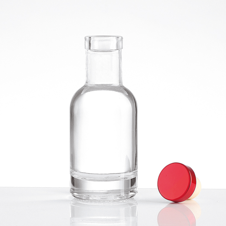 Mini botella de licor vacía de vino de vidrio