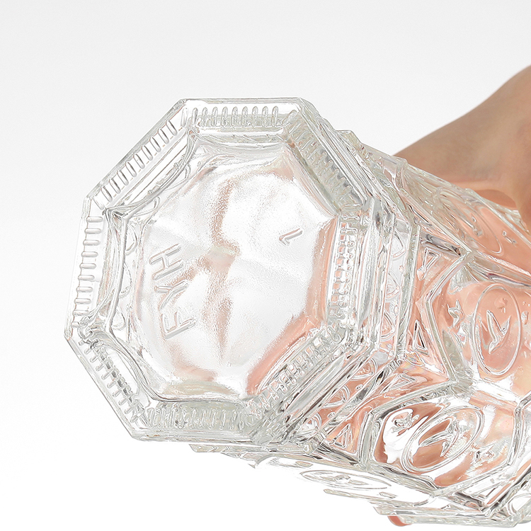 Mini botella de pequeña capacidad con patrón fino.