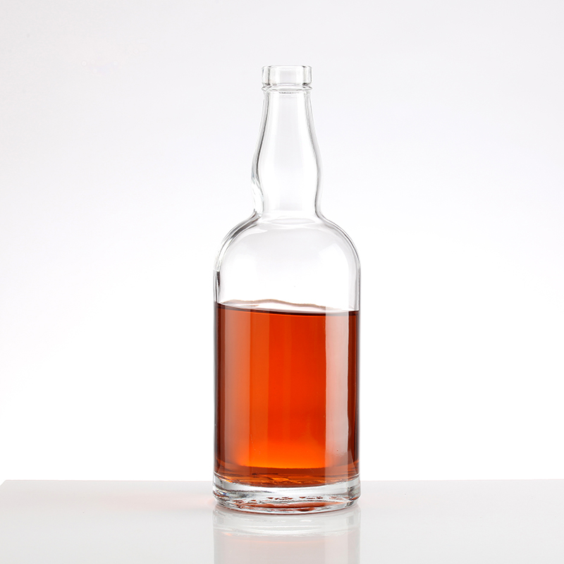 Botella de whisky vacía de vidrio de 750 ml.