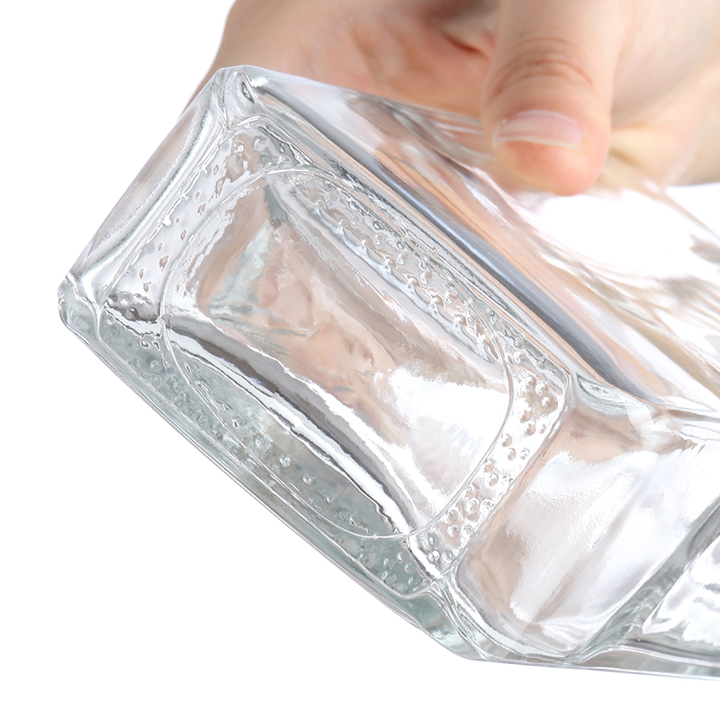 Botella de vidrio rectangular alta