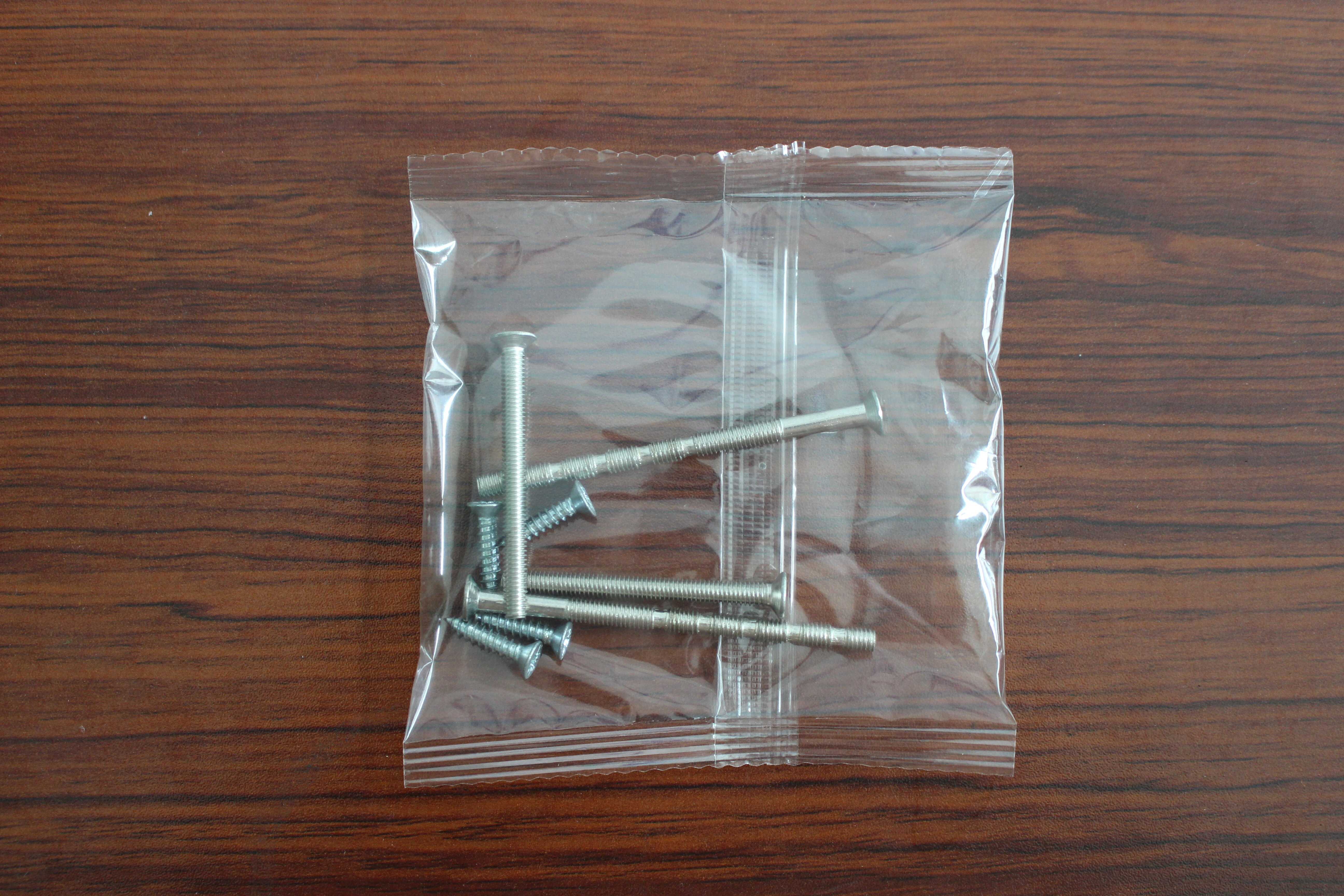 Three-plate screw packaging machine