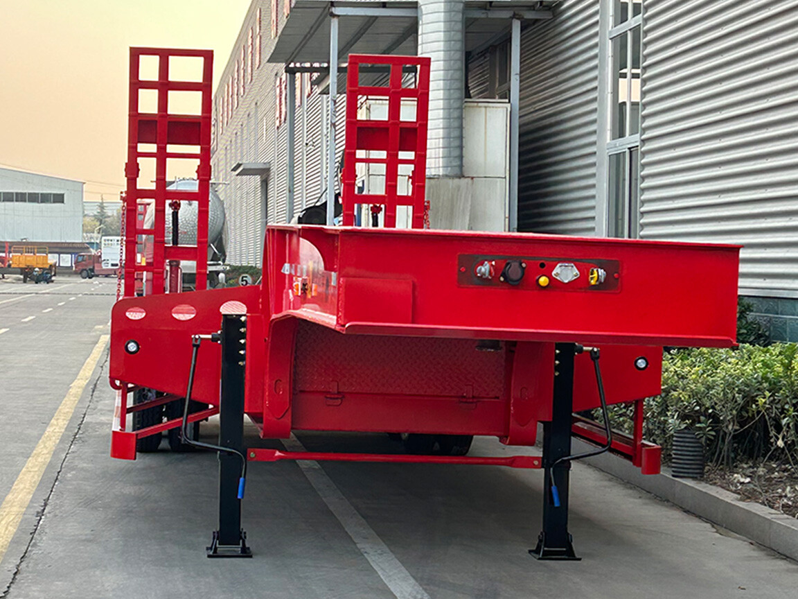 Полуприцеп с низкорамной платформой 3 оси 60T с гусеничной тележкой