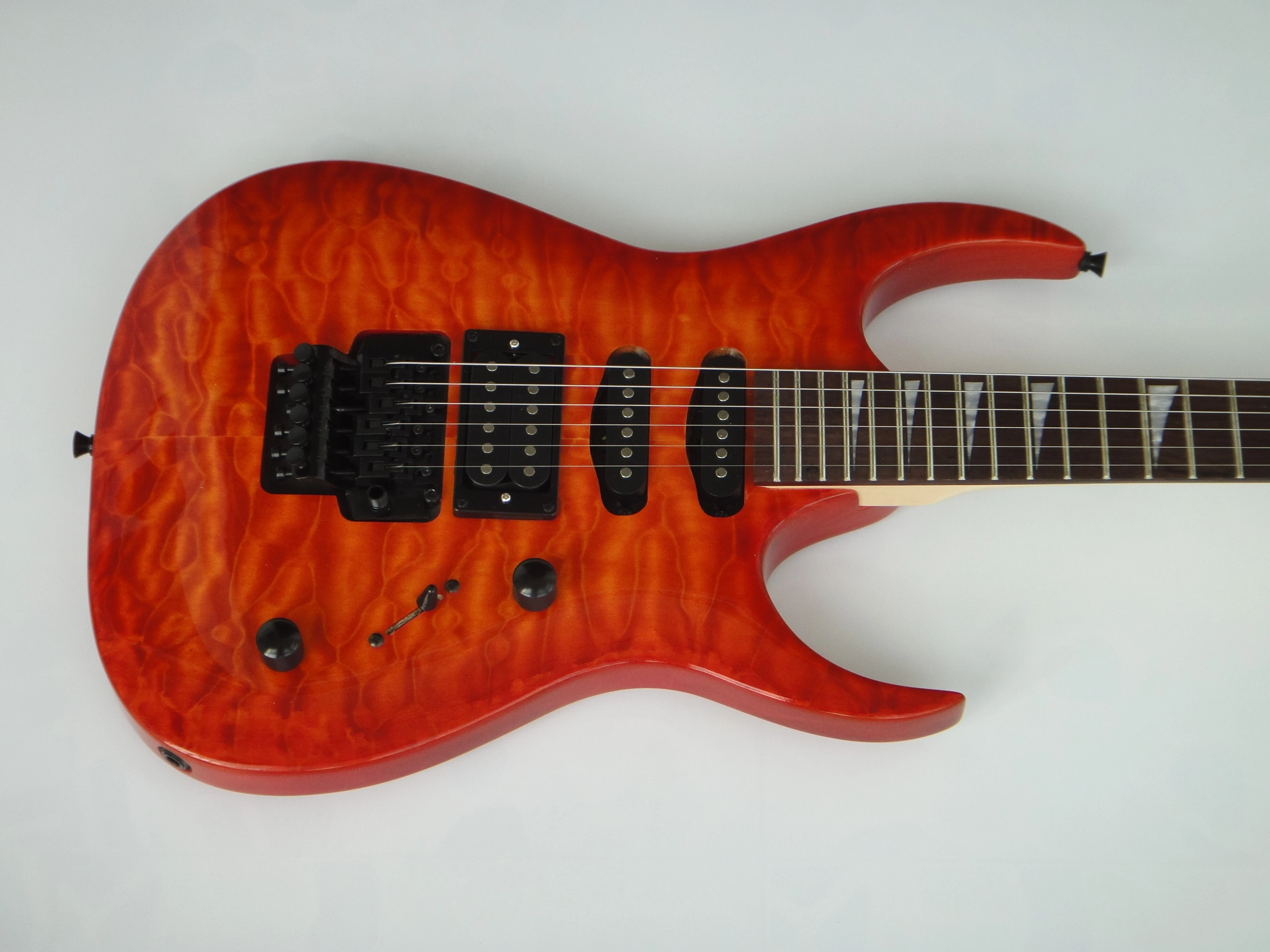 Guitarra eléctrica Afanti de caoba con chapa de arce acolchado