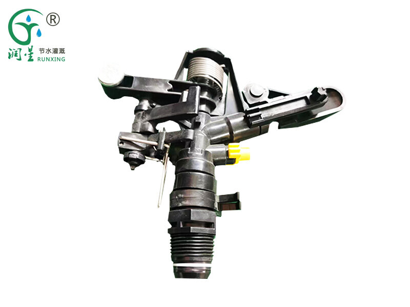 Aspersor de brazo basculante