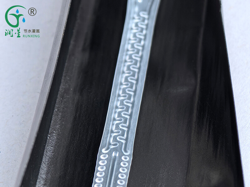 Fita de irrigação por gotejamento contínuo