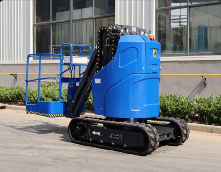 Fábrica de origen, altura de plataforma de 7 m, admite el trabajo eficiente y seguro de 2 personas; diseño de orugas adecuado para diversos terrenos, elevador de mástil vertical