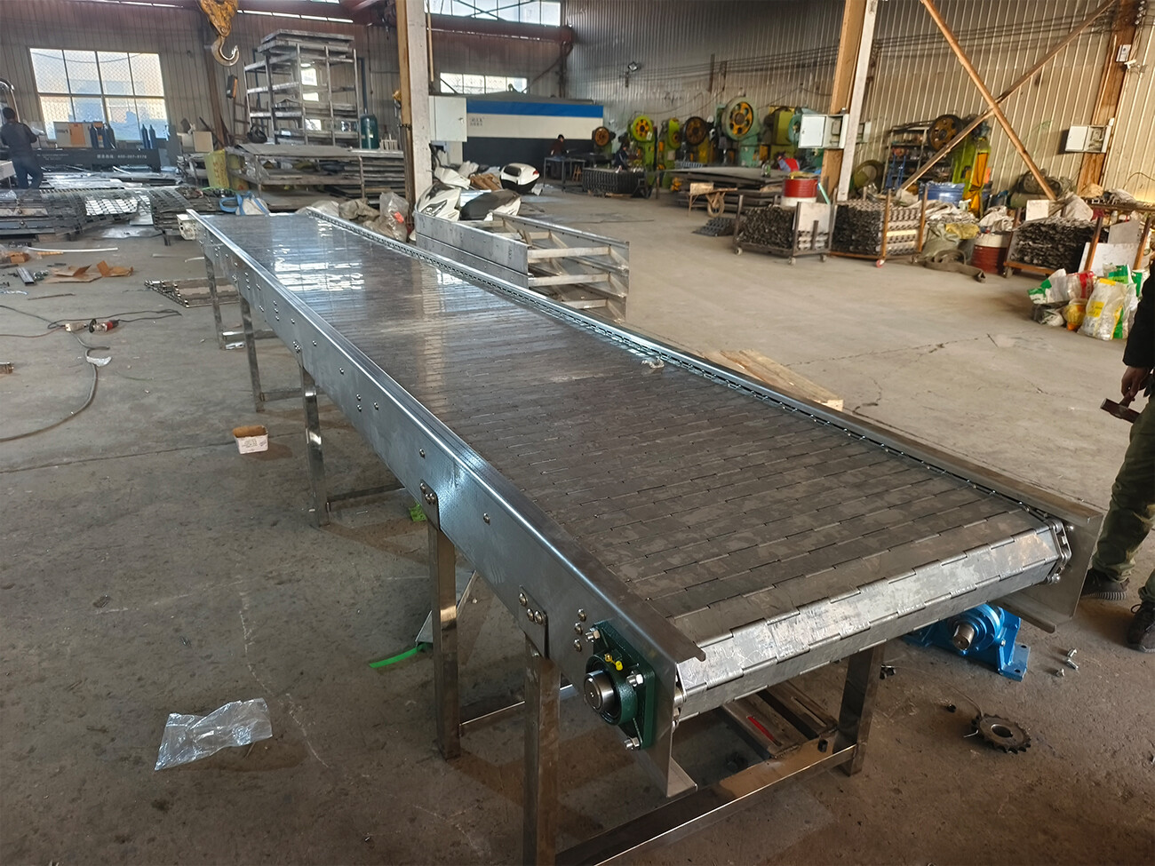 Perbedaan dan pemeliharaan antara konveyor rantai dan roda gigi