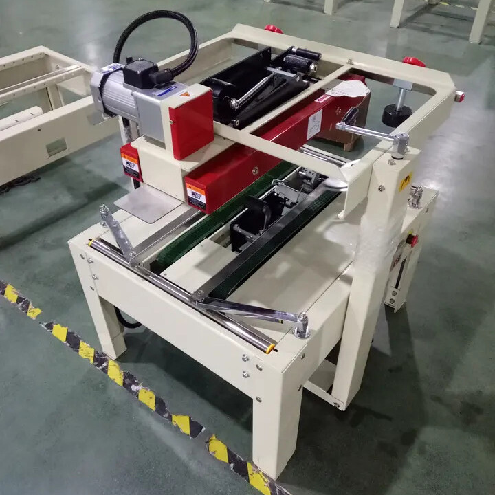 FXJ5050II Automatic Top and Bottom Drive Belt Carton Case Box Adhesive Tape Sealing Machine