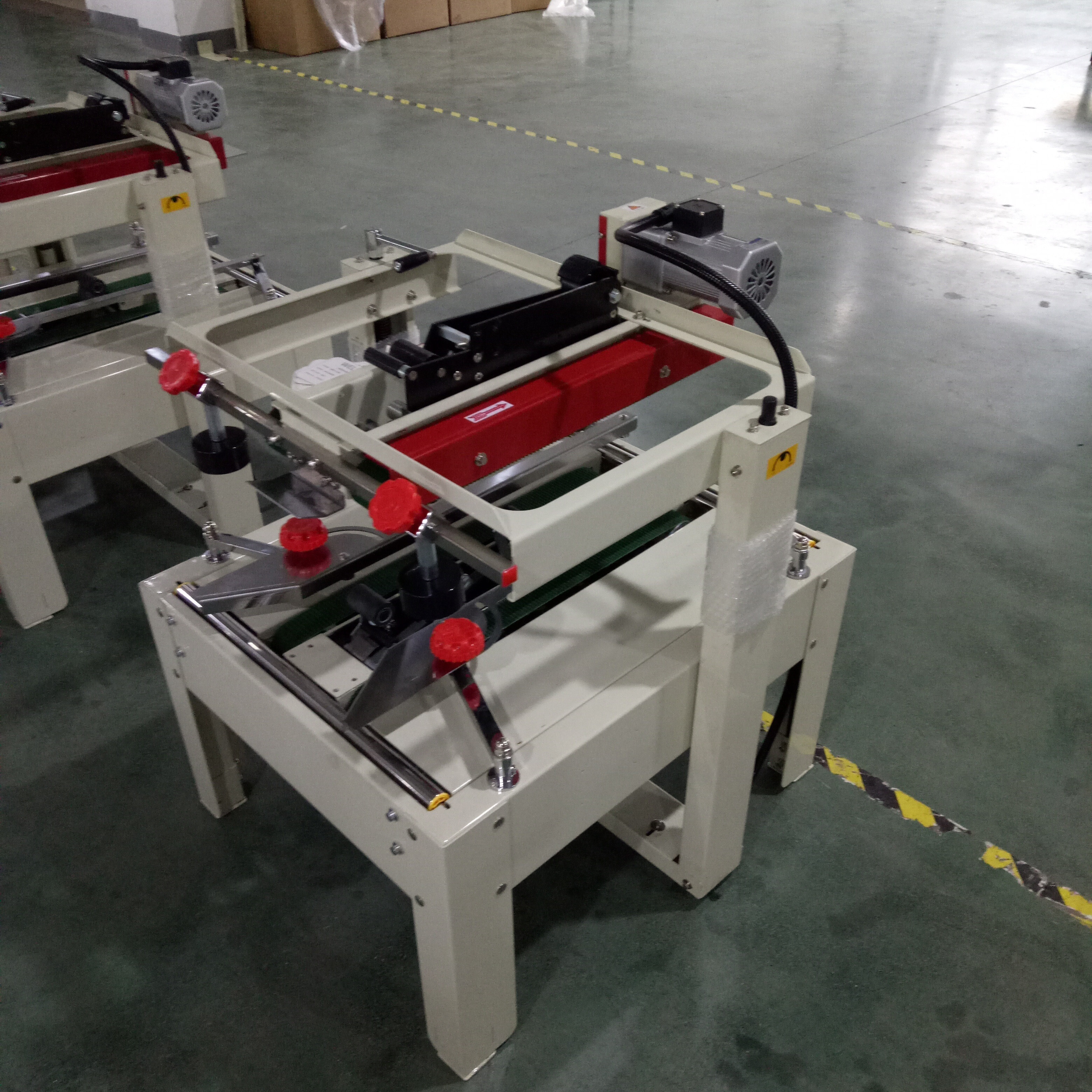FXJ5050II Automatic Top and Bottom Drive Belt Carton Case Box Adhesive Tape Sealing Machine