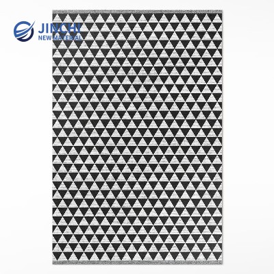 PVC rug with geometric triangle pattern