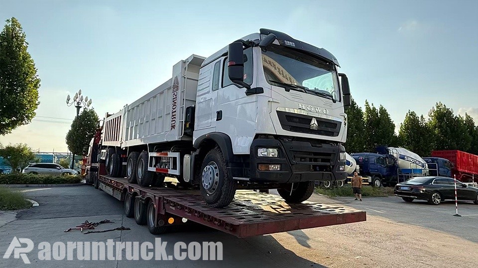 embarque de caminhão basculante Envio de dois modelos para Botsuana: 1 unidade SINOTRUK HOWO TX 6x4 e 1 unidade Hohan 6x4 de caminhão basculante entregues