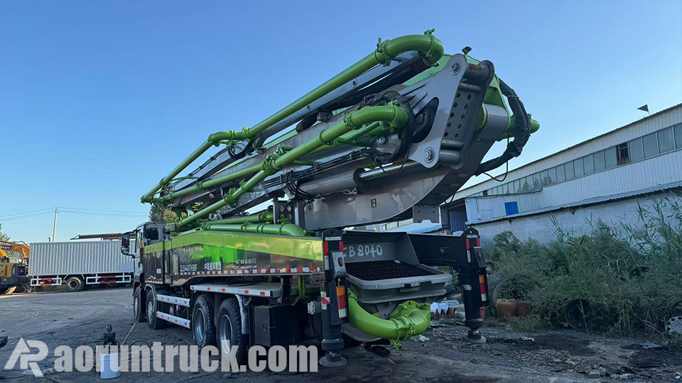 preço de exportação e contrato de depósito para caminhão-bomba SITRAK 8x4 Cliente malinês assina contrato e paga depósito pelo caminhão-bomba de concreto com lança SINOTRUK SITRAK 8x4 após auditoria na fábrica