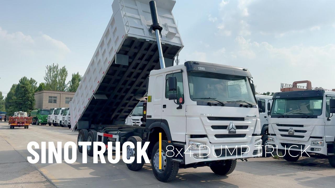 Volquete HOWO 8x4: caja de carga de gran volumen de 31 m³.