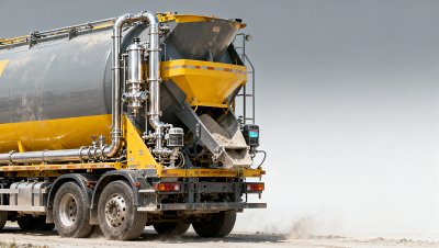 Bulk cement trailer pneumatic system moisture buildup triggers unexpected valve lockups