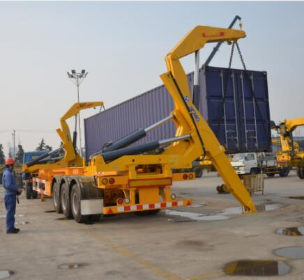 SINOTRUK SIDE LIFTING CONTAINER TRAILER WITH CRANE