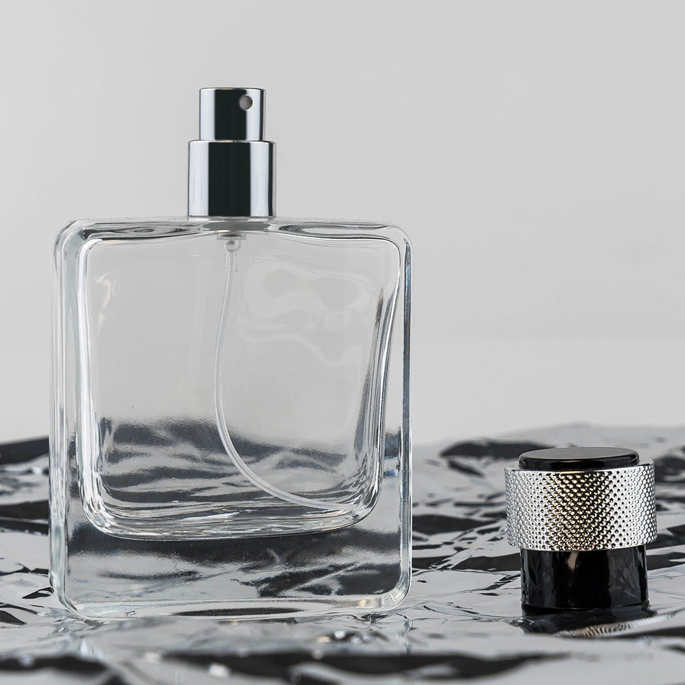 Fabricante de botellas de perfume de lujo de alta calidad, 50 ml y 100 ml, botellas de vidrio vacías recargables con pulverizador, hermosas botellas de perfume